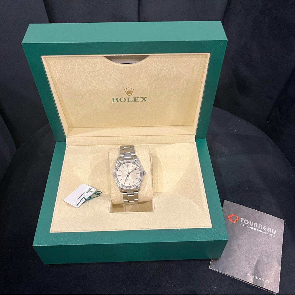 Rolex Silver Watch with Green Box
